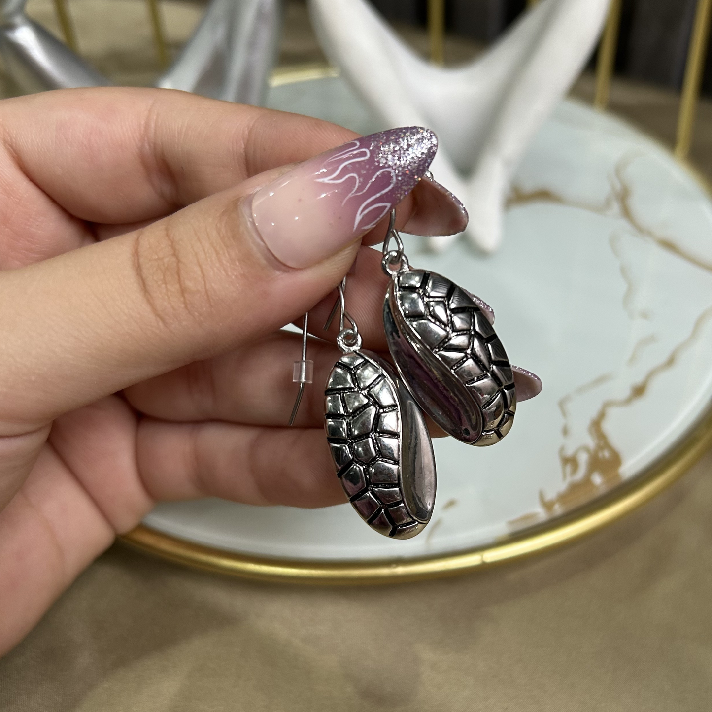 The Silver Shell Studs