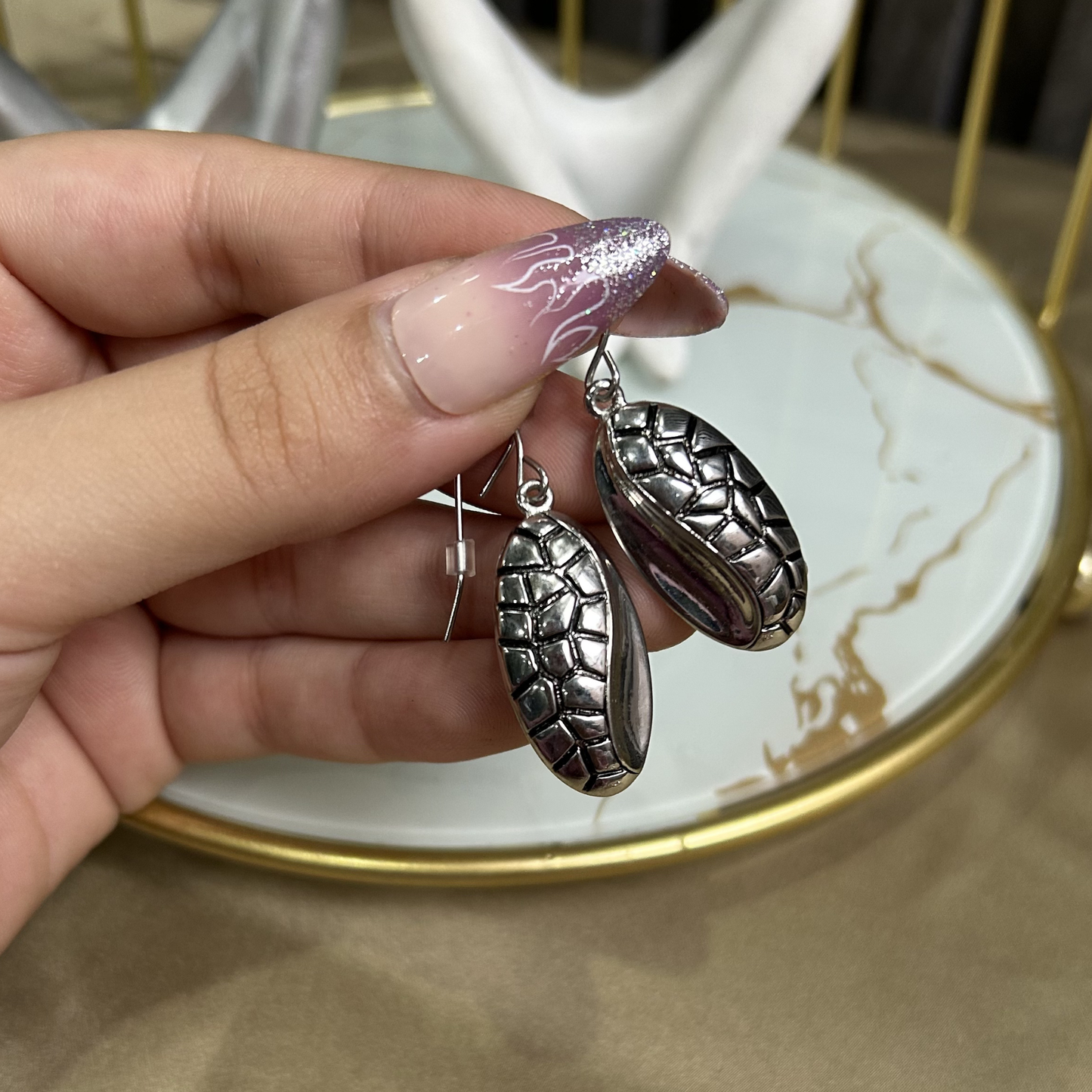 The Silver Shell Studs