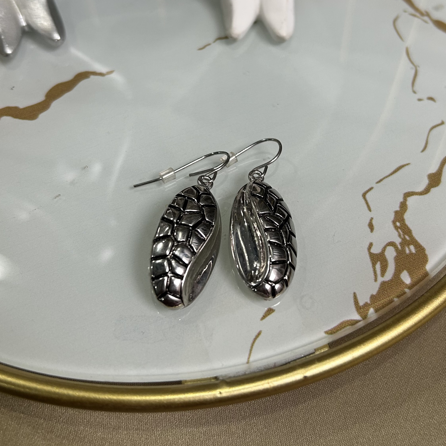 The Silver Shell Studs